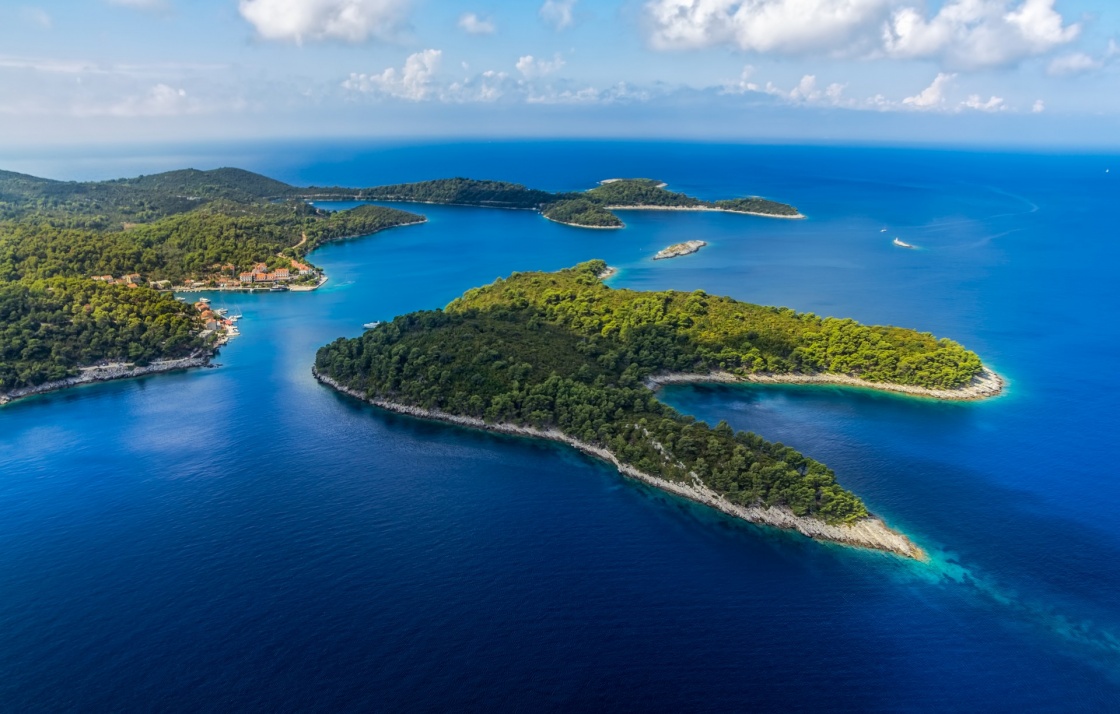 'Aerial helicopter shoot of National park on island Mljet, village Pomena, Dubrovnik archipelago, Croatia. The oldest pine forest in Europe preserved.' - Dubrovník